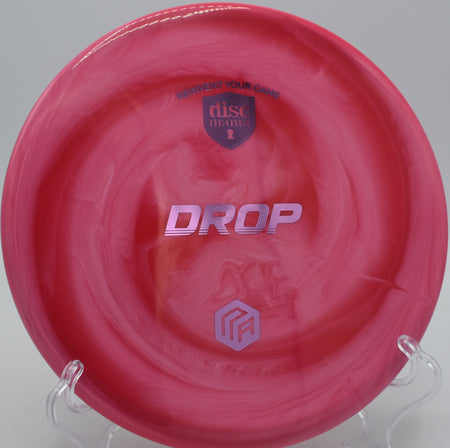 Discmania Creator Series Swirl S-Line Drop fairway driver carving a straight control shot at Maple Hill Disc Golf Course in Leicester, Massachusetts