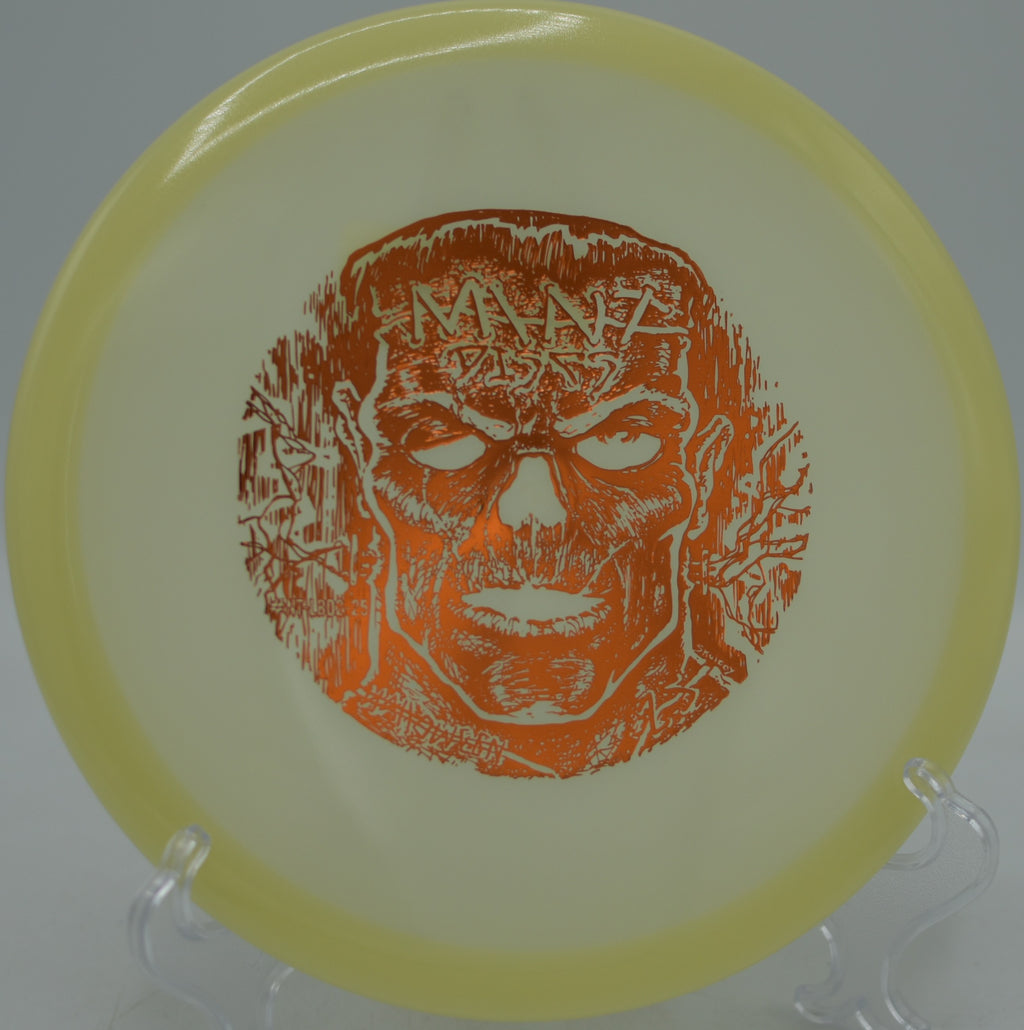 Mint Lobster – Halloween Glow edition soaring through trees at Tyler State Park Disc Golf Course in Newtown, Pennsylvania.