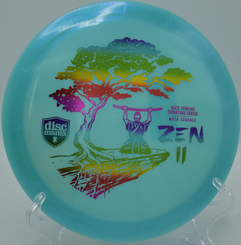 Discmania Nate Perkins Zen 2 Meta Essence fairway driver flying smooth S-curve lines at Fox Run Meadows Disc Golf Course in Jeffersonville, Vermont.