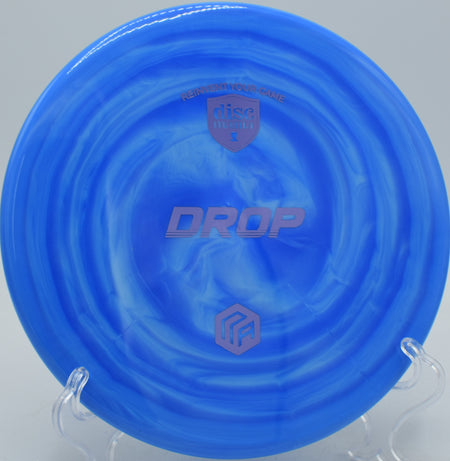 Discmania Creator Series Drop disc flying a reliable hyzer at Idlewild Disc Golf Course in Burlington, Kentucky