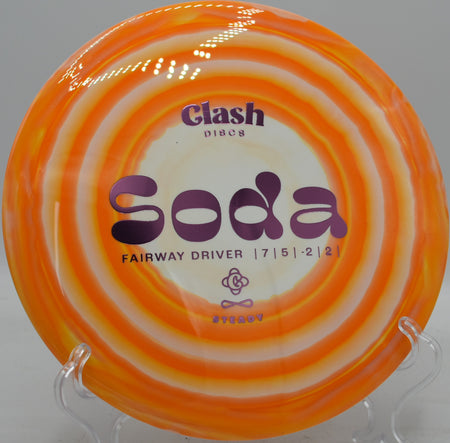 Steady Soda flipping to flat on a controlled fairway shot, gliding straight through a wooded tunnel at Maple Hill.