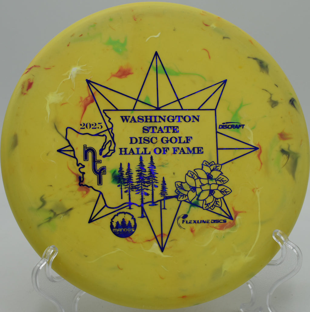 Discraft Zone in Jawbreaker plastic nestling up under the basket at Harmony Bends in Columbia, Missouri