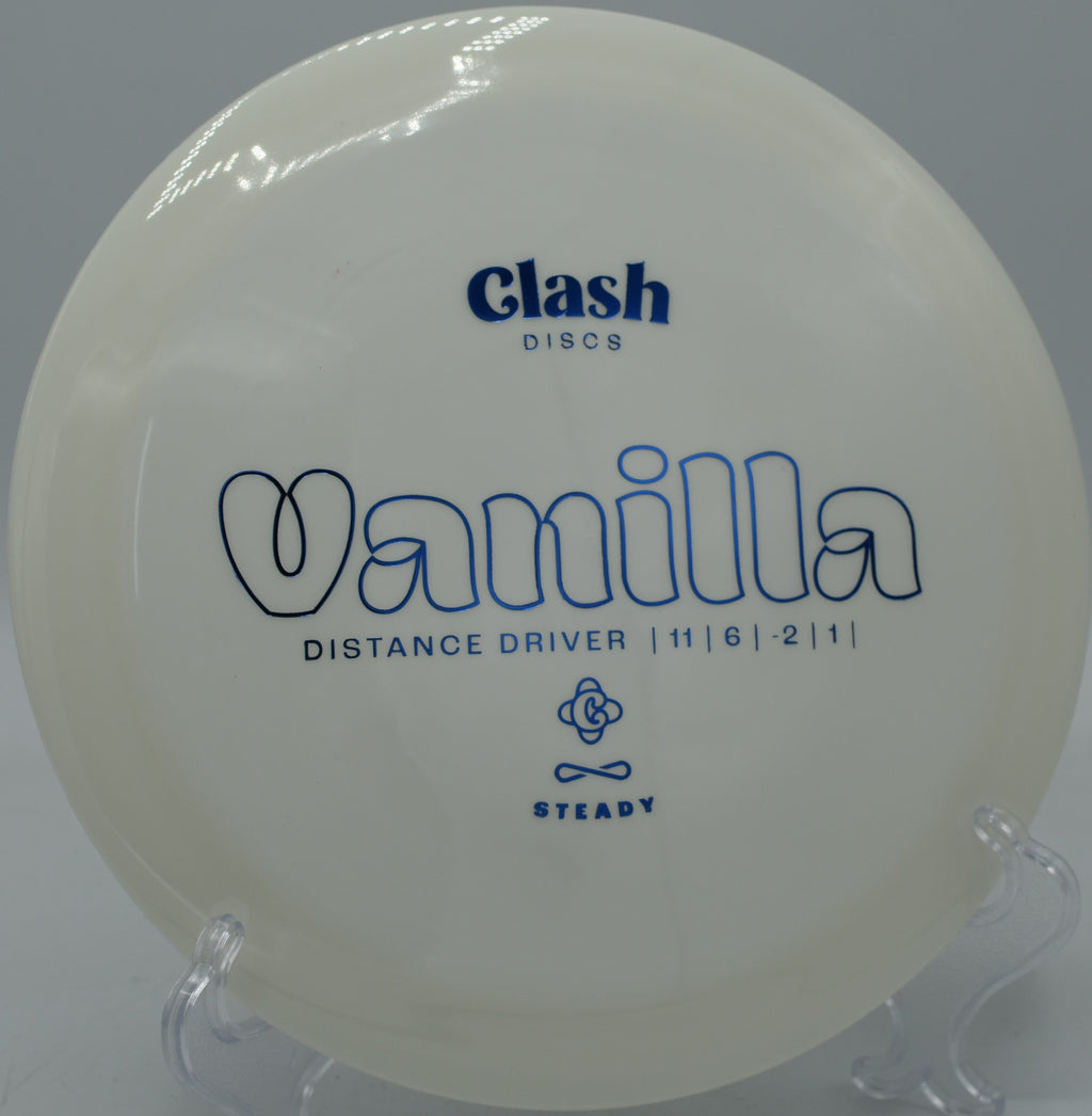 Vanilla driver holding a long turnover line with late finish at Maple Hill Disc Golf Course in Leicester, Massachusetts.