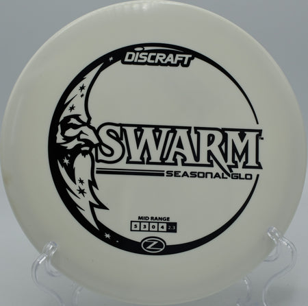 "At Celestial Park Disc Golf in Minneapolis, MN, GLO-Z Swarm offers a striking, neon-bright flight and aggressive fade for precision plays."