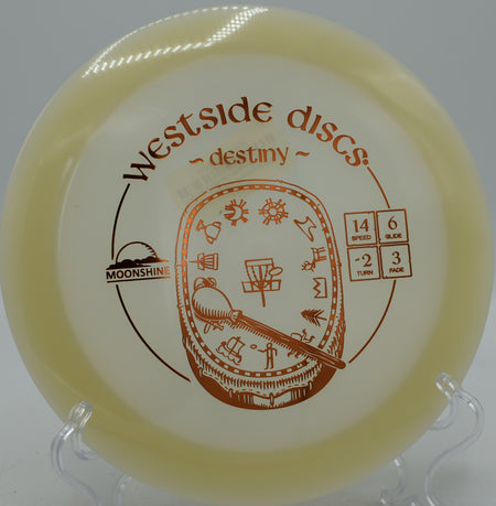 Westside Destiny VIP Moonshine plastic glowing brightly during a night round at Hornets Nest Disc Golf Course in Charlotte, North Carolina.