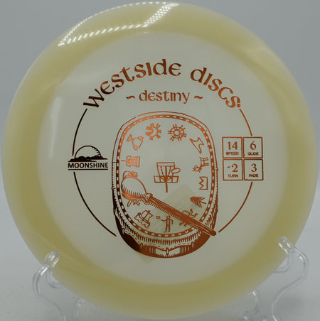 VIP Moonshine Destiny Westside Discs glow distance driver parked on a wide anhyzer at Moraine State Park Disc Golf Course in Portersville, Pennsylvania.