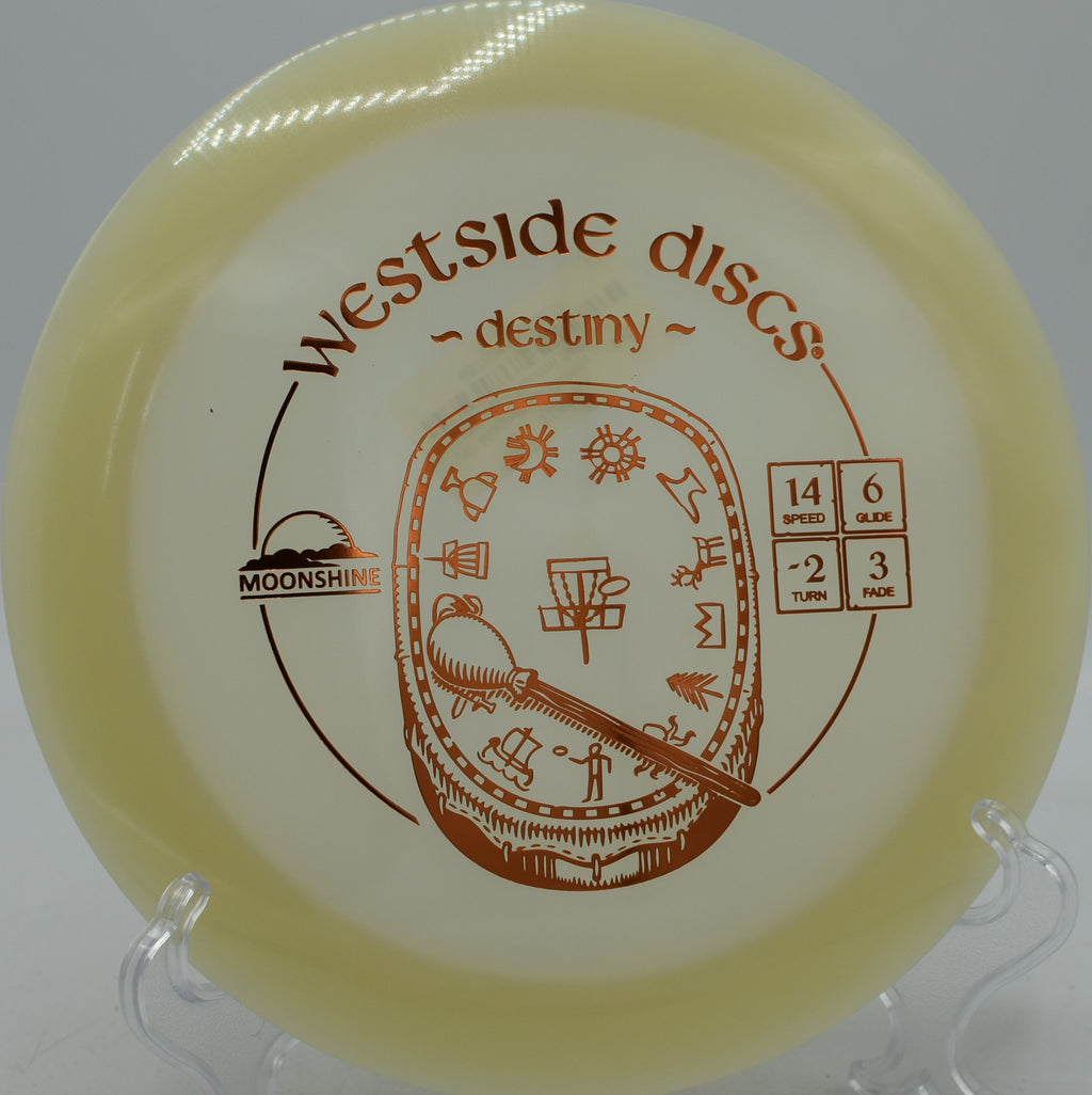 VIP Moonshine Destiny Westside glow plastic disc soaring straight with glide at Blue Ribbon Pines Disc Golf Course in East Bethel, Minnesota.