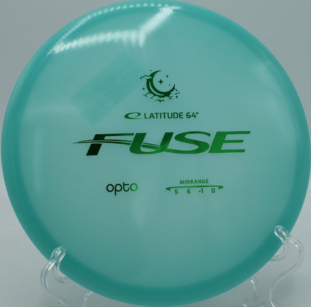 Latitude 64° Opto Moonshine Fuse glow midrange parked under the basket at Hornets Nest Disc Golf Course in Charlotte, North Carolina.