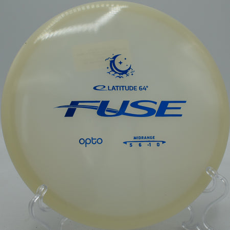 Latitude 64° Opto Moonshine Fuse midrange glowing brightly during a night round at Water Works Park Disc Golf Course in Kansas City, Missouri.