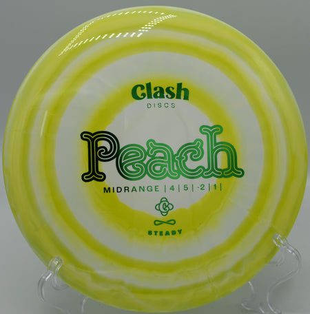 Steady Ring Peach floating through a tight wooded fairway on Hole 10 at Hidden Ridge Disc Golf Course, West Milford, New Jersey.