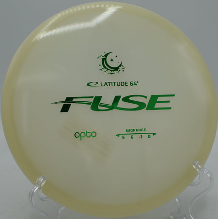 Opto Moonshine Fuse Latitude 64° glow plastic disc holding a smooth anhyzer at Blue Ribbon Pines Disc Golf Course in East Bethel, Minnesota.