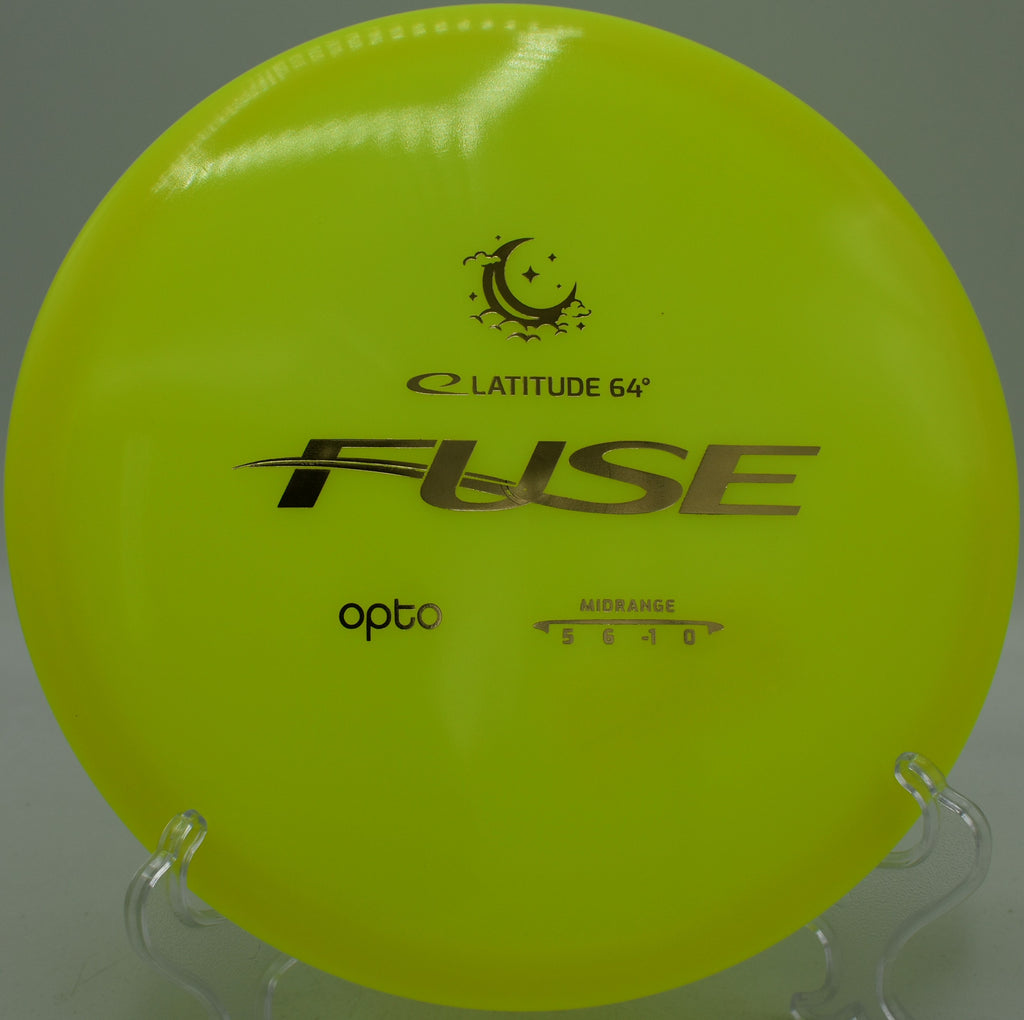 Opto Moonshine Fuse Latitude 64° glow midrange floating straight with glide at Northwood Black Disc Golf Course in Morton, Illinois.