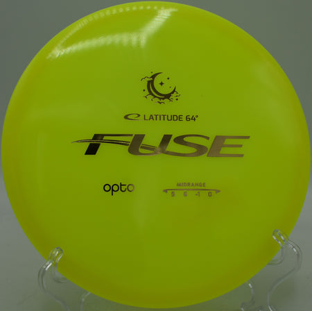 Opto Moonshine Fuse Latitude 64° glow midrange floating straight with glide at Northwood Black Disc Golf Course in Morton, Illinois.