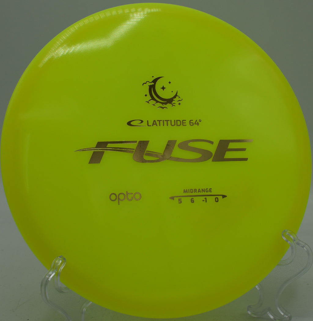 Latitude 64° Opto Moonshine Fuse glow disc parked on a night hyzer at Winthrop Gold Disc Golf Course in Rock Hill, South Carolina.