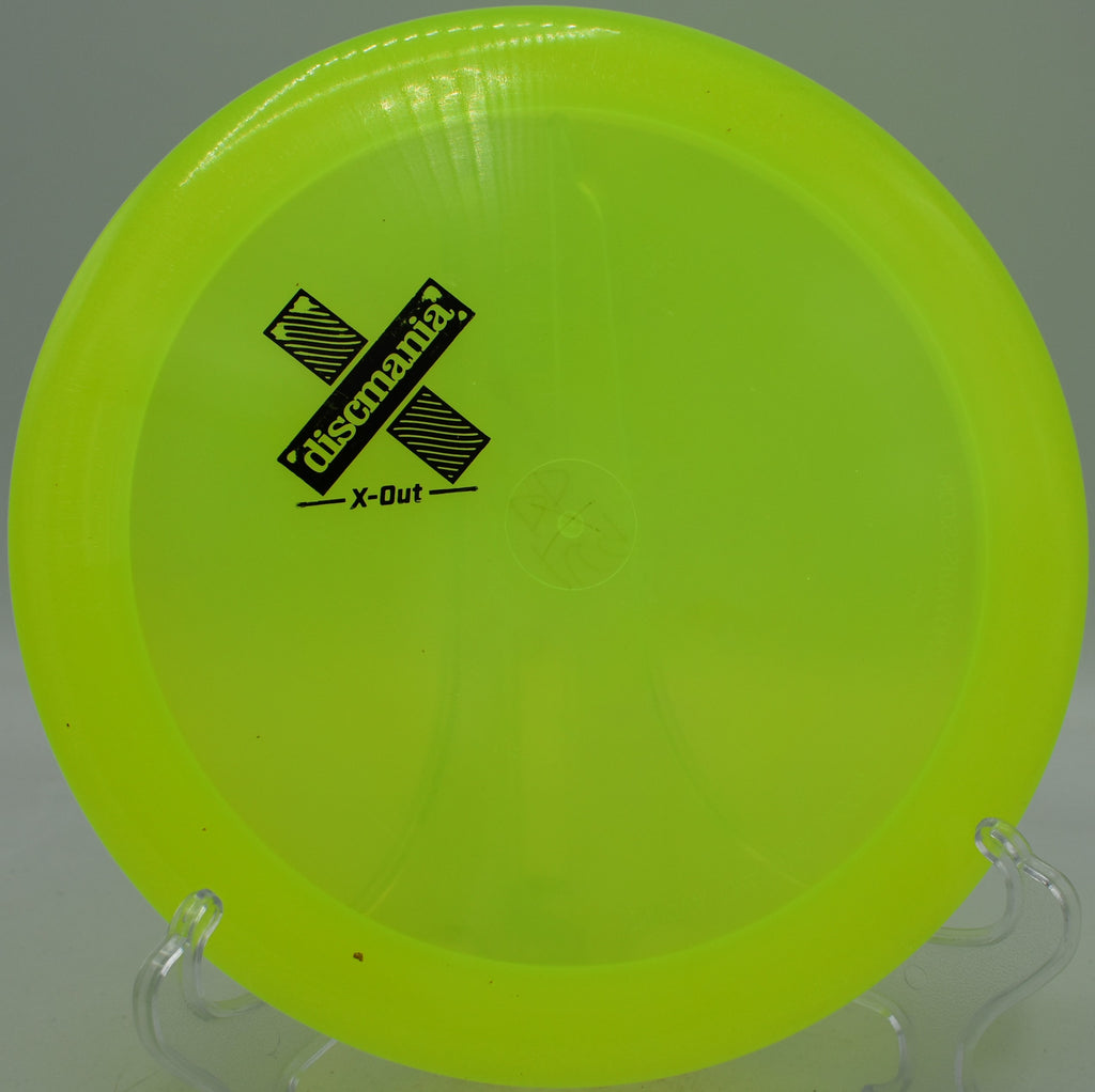 Discmania C-Line DD Innova Made penned driver with light storage wear displayed at Maple Hill Disc Golf Course in Leicester, Massachusetts.