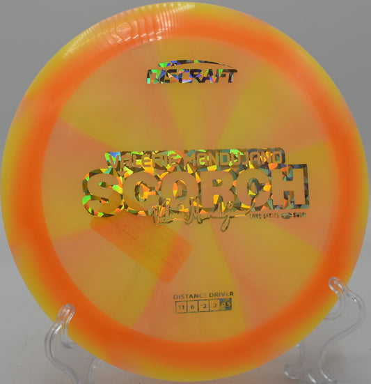 Discraft Z Swirl Scorch gliding huge distance lines at Eagles Crossing in Hawk Point, Missouri.