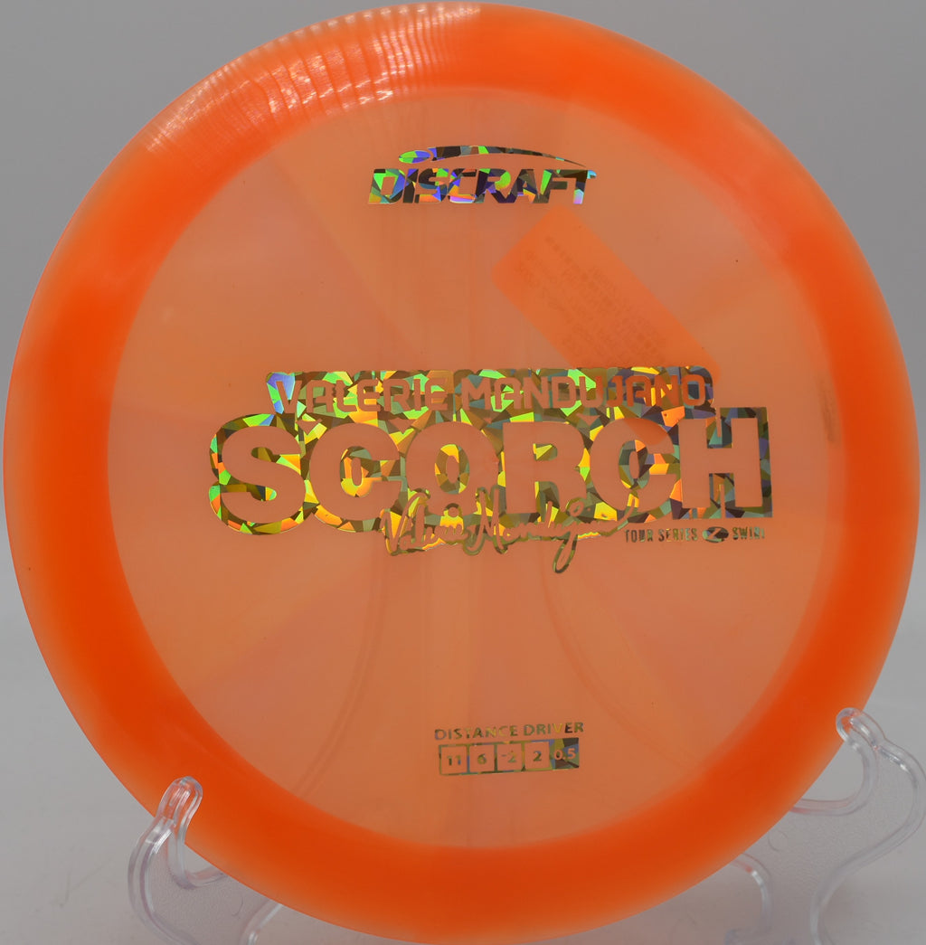 Scorch in Z Swirl plastic bombing downhill at North Cove DGC in Marion, North Carolina.