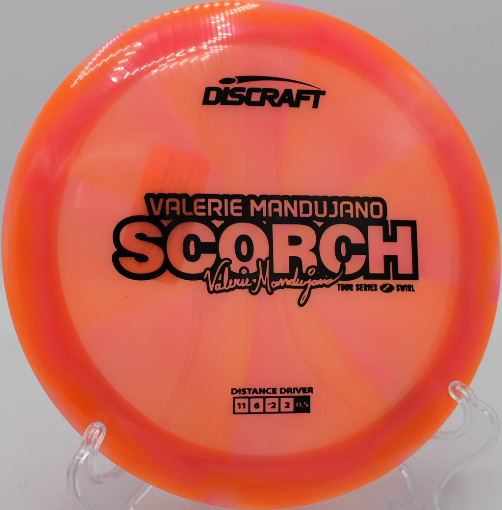 Discraft Scorch holding a late-turning line through trees at Water Works Park in Kansas City, Missouri.