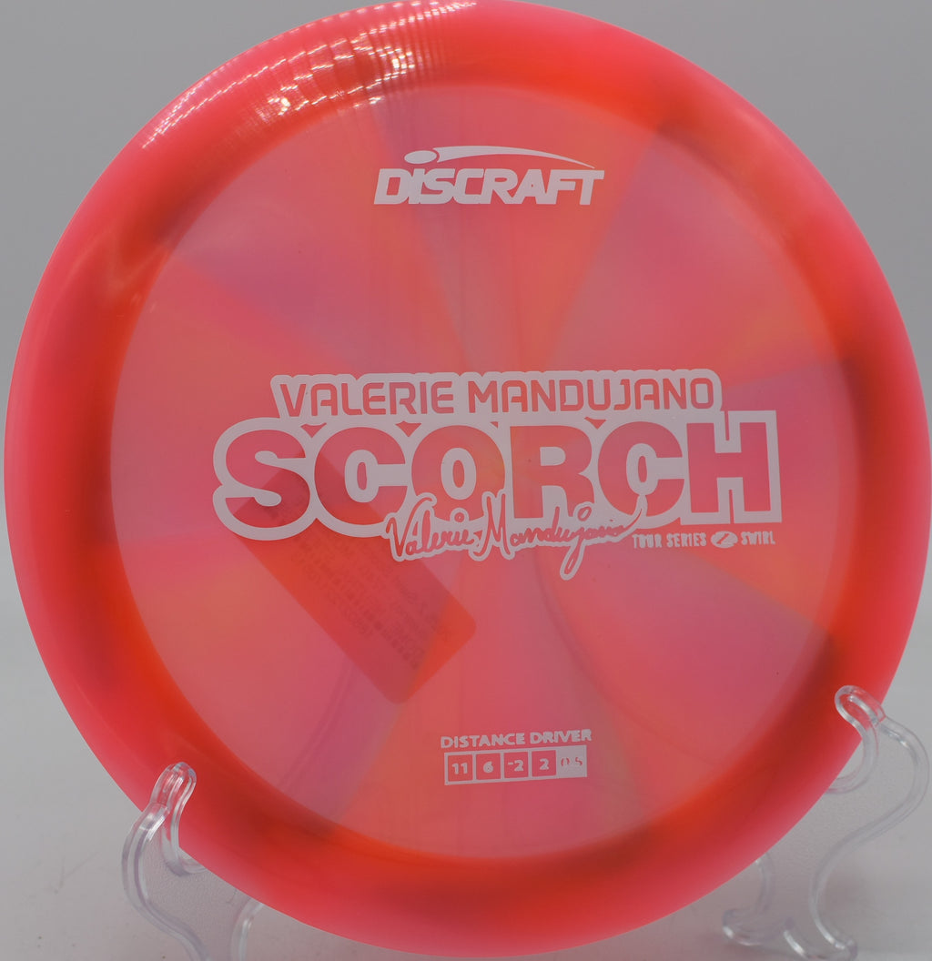 Discraft Z Swirl Scorch soaring past 400 feet on open fairway at Sunset Park in Las Vegas, Nevada.