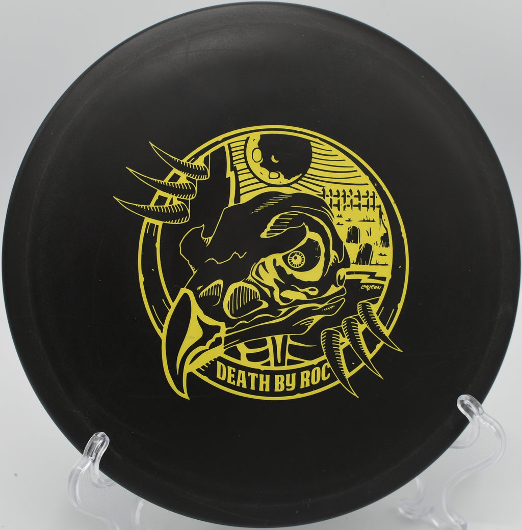 Innova DX Roc fading gently toward the basket on Hole 11 at Branson Trails Disc Golf Course, Branson, Missouri.