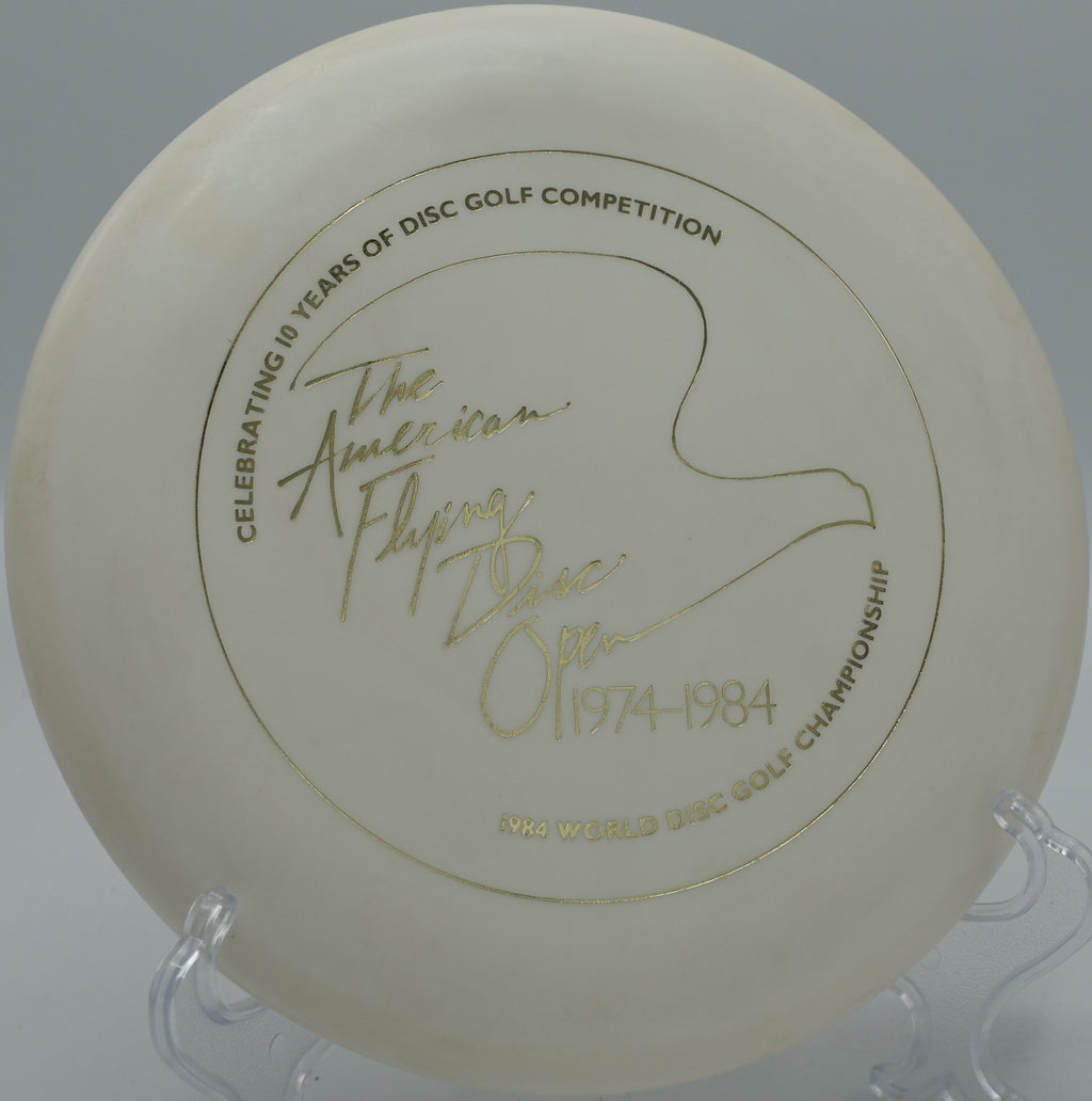 Innova DX Aviar fading gently left toward the chains on Hole 5 at The Bear Disc Golf Course, Hickory, North Carolina.