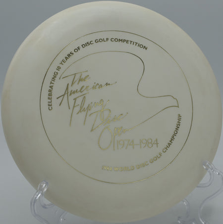 Innova DX Aviar fading gently left toward the chains on Hole 5 at The Bear Disc Golf Course, Hickory, North Carolina.