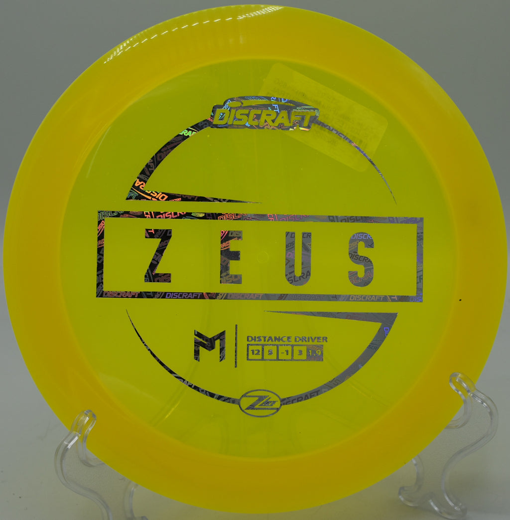 "Discraft Zeus Z Lite – Great for developing arms seeking distance at Sabattus Disc Golf Complex in Maine."