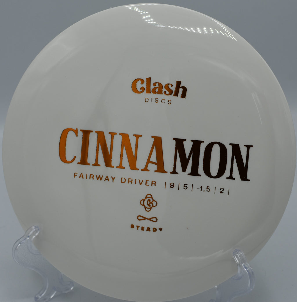 Clash Discs Steady Cinnamon holding a flex shot on Hole 5 at Rolling Pines Disc Golf Course, Wilkesboro, North Carolina.