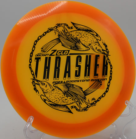 Discraft Z Glo Thrasher carving a max-distance flex shot on Hole 8 at Trophy Club Disc Golf Course, Trophy Club, Texas.