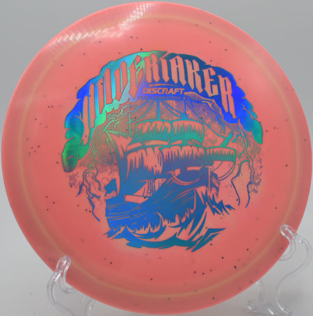 ESP Glo Sparkle Undertaker soaring through the night sky with accuracy on Hole 10 at Kincaid Park Disc Golf Course, Anchorage, Alaska.