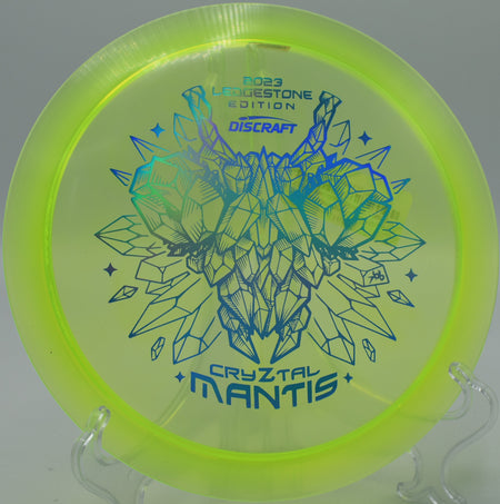 Discraft CryZtal Mantis floating cleanly toward the basket on Hole 8 at Trophy Club Disc Golf Course, Trophy Club, Texas.