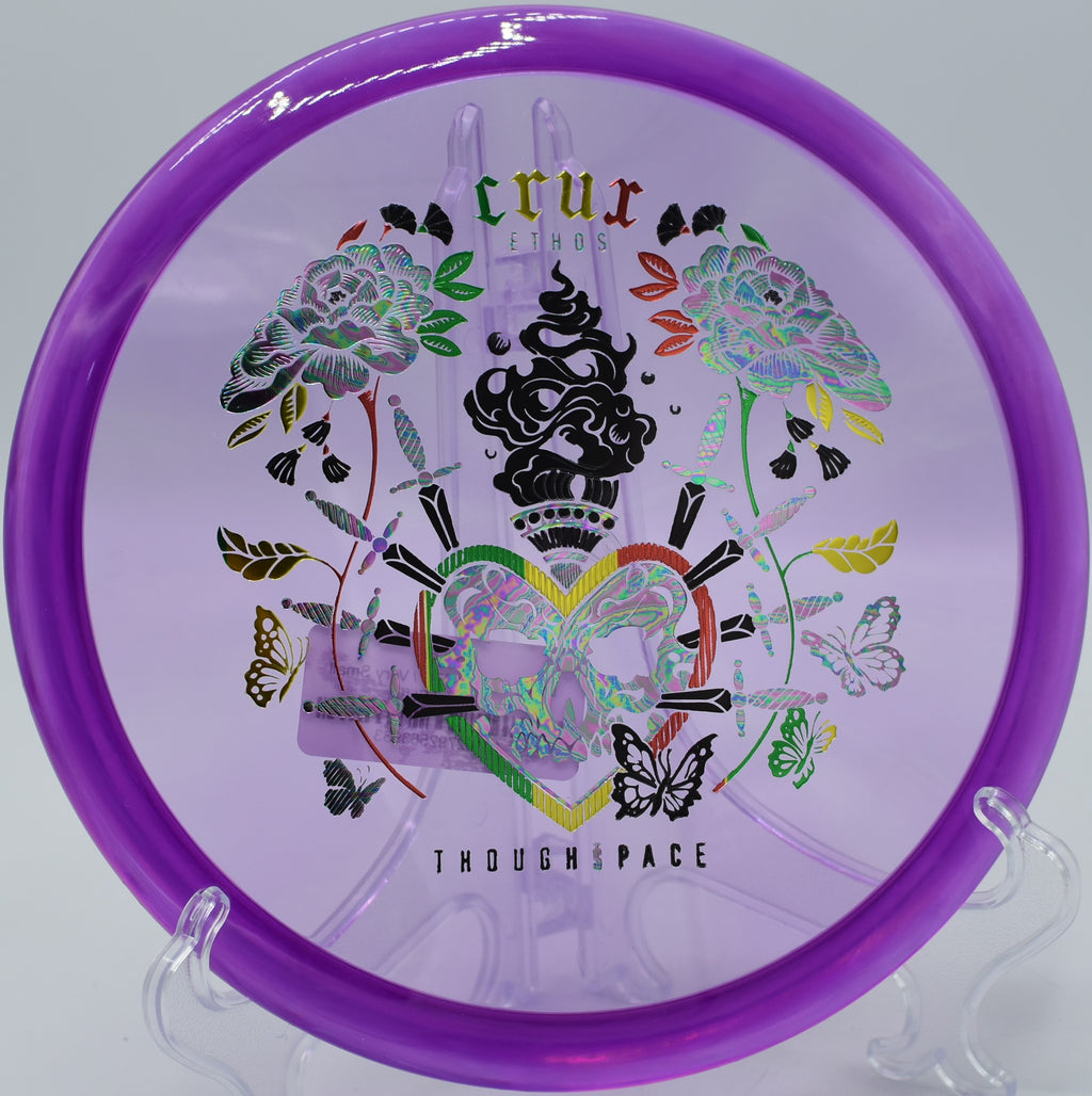 Player crushing an uphill drive with Ethos Crux at Maple Hill Disc Golf Course in Leicester, Massachusetts