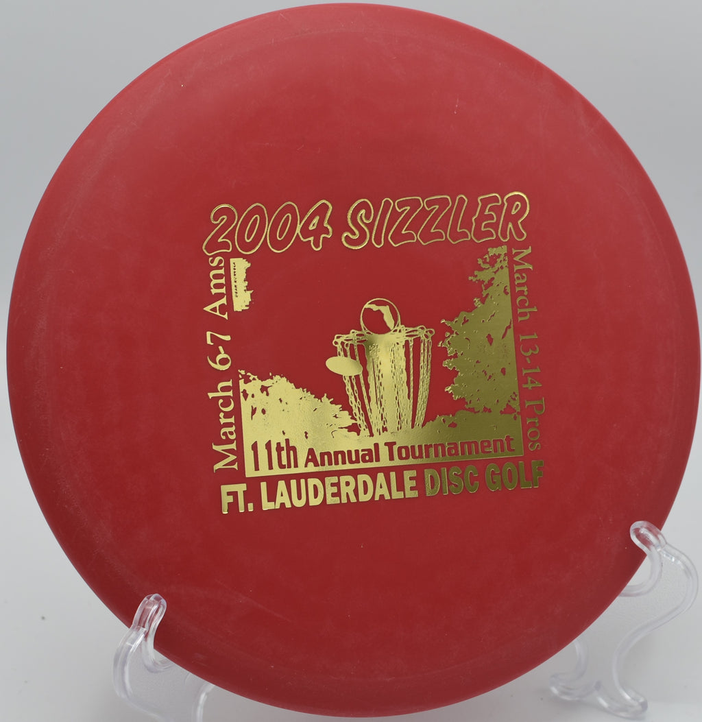 Innova DX Roc slicing through the woods on Hole 3 at Bald Mountain Disc Golf Course, Lake Orion, Michigan.