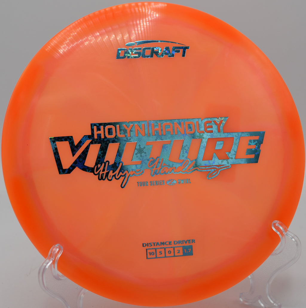 Z Swirl Vulture gliding straight before fading around the corner at Zephyrhills Disc Golf Course in Florida.