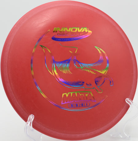 An Innova DX Manta floating down the fairway at Whispering Pines Disc Golf Course in Eau Claire, Wisconsin, on a smooth turnover shot.