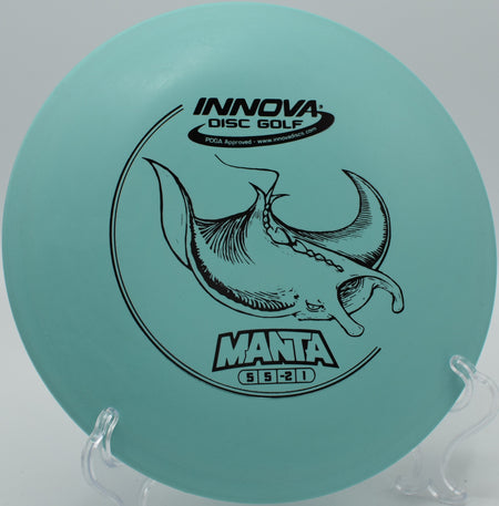 An Innova DX Manta flipping up and gliding through the woods at Big Creek Disc Golf Course in Polk City, Iowa.