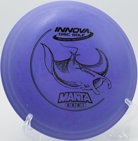 A disc golfer throwing a smooth anhyzer approach with a DX Manta at Foothills Disc Golf Course in Easley, South Carolina.