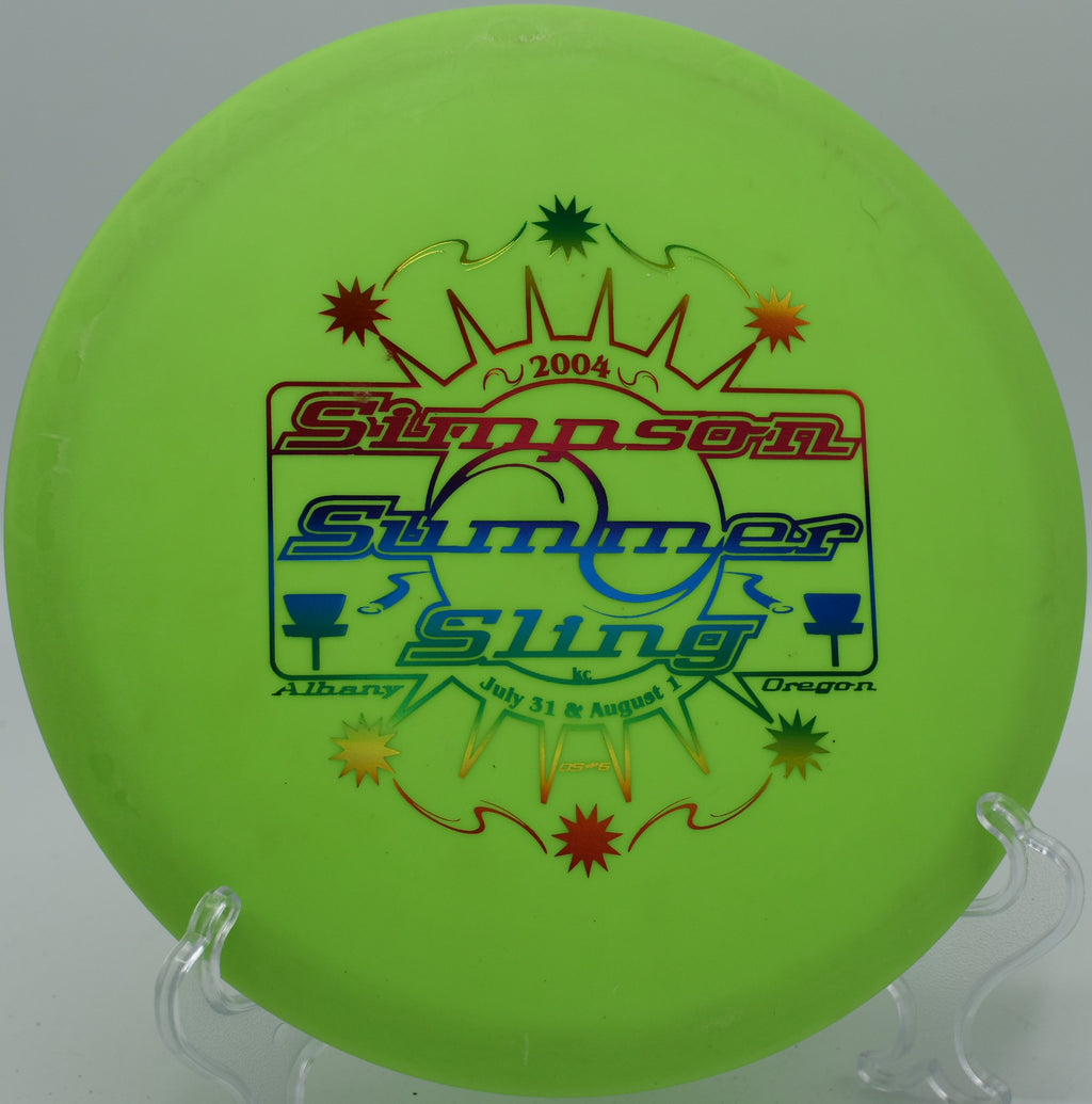 Innova DX Roc settling softly near the target on Hole 4 at Heritage Park Disc Golf Course, Adrian, Michigan.