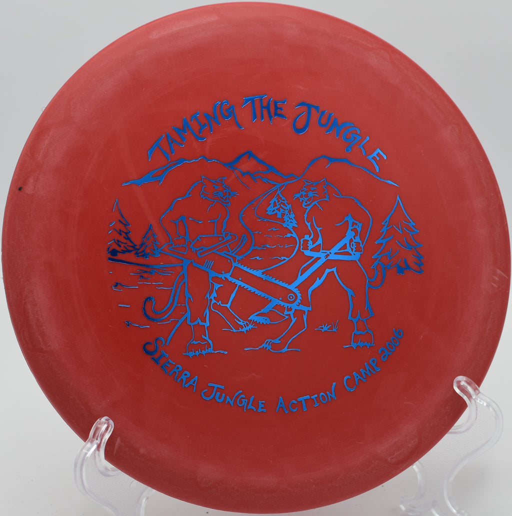 Innova DX Roc fading gently toward the pin on Hole 12 at Sunnyside Disc Golf Course, Charleston, West Virginia.