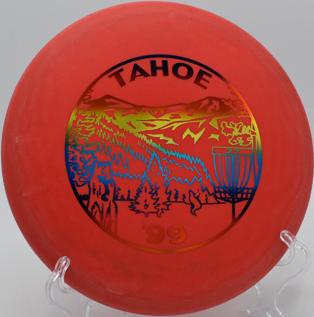 Innova DX Roc skipping softly onto the green on Hole 18 at West Meadowbrook Park Disc Golf Course, Greenville, North Carolina.