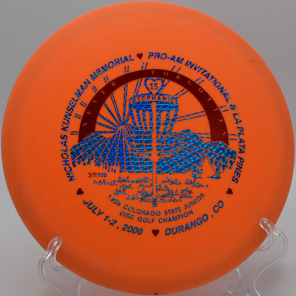 Innova DX Roc settling near the pin after a forehand approach on Hole 3 at Flyboy Aviation Disc Golf Course, Whitesburg, Georgia.