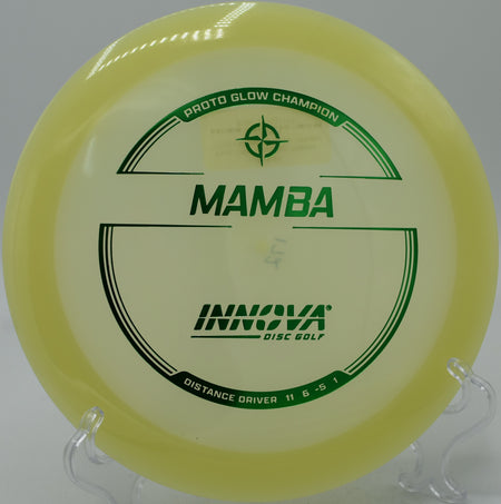 Proto Glow Champion Mamba flipping flat through the trees at Mohawk Park in Tulsa, Oklahoma.