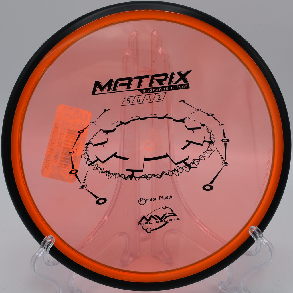 A disc golfer using a Proton Matrix for a precision midrange shot at Pioneer Park Disc Golf Course in Billings, Montana.