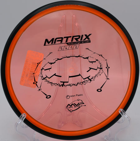 A disc golfer using a Proton Matrix for a precision midrange shot at Pioneer Park Disc Golf Course in Billings, Montana.