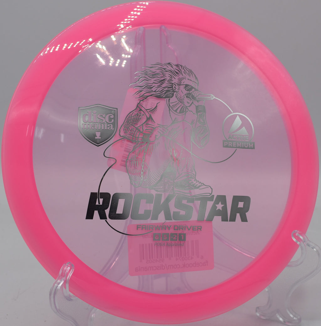 Active Premium Rockstar Discmania understable fairway driver parked on long anhyzers at DeLaveaga Disc Golf Course in Santa Cruz, California.