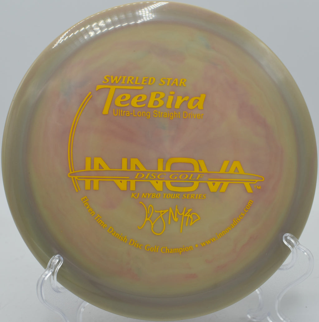 Innova Swirly TeeBird flying over a rolling hillside fairway at Hornings Hideout in North Plains, Oregon