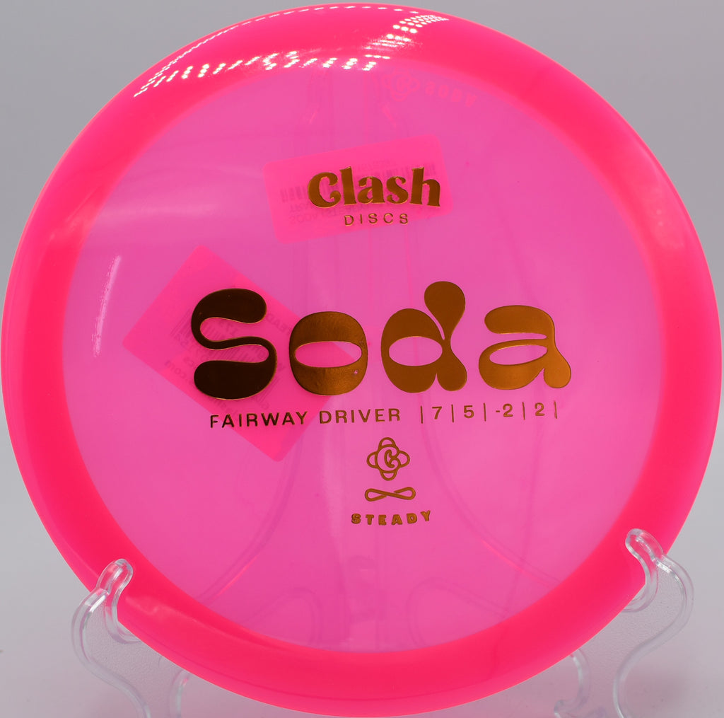 Clash Discs Steady Soda fading gently toward the green on Hole 17 at Trophy Club Disc Golf Course, Trophy Club, Texas.