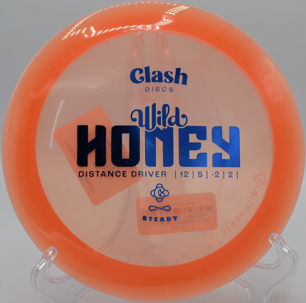 Clash Discs Steady Wild Honey floating toward the basket on Hole 5 at Wreckreator Disc Golf Course, Palouse, Washington.