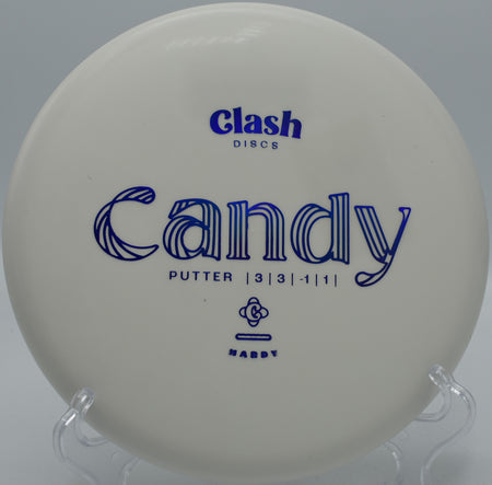 Clash Discs Hardy Candy fading softly into the chains on Hole 10 at Trophy Club Disc Golf Course, Trophy Club, Texas.