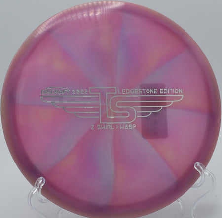 Discraft Z Wasp floating smoothly through the air on Hole 3 at Heritage Park Disc Golf Course, Adrian, Michigan.